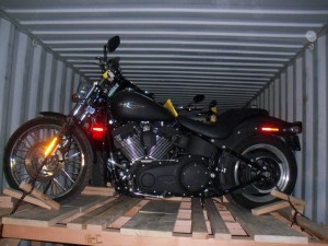 Image of motorcycle shipping in containers by Schumacher Cargo Logistics